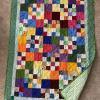 Multicolor squares with green backing, binding and border